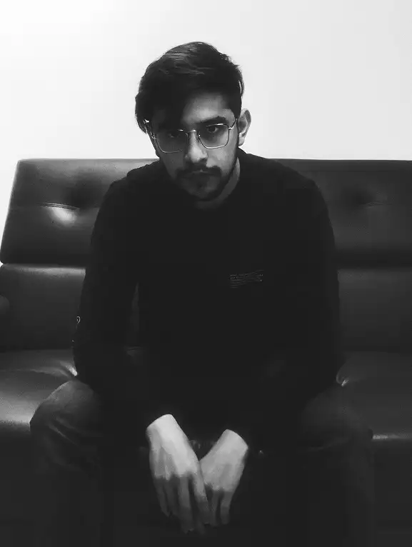 Black and white portrait of Cesar Cruz