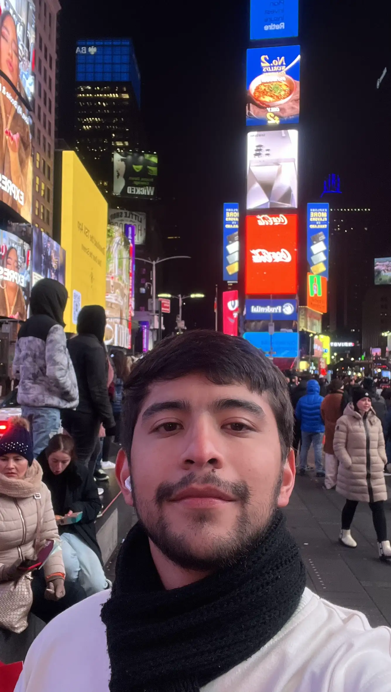 Cesar Cruz in Times Square at night